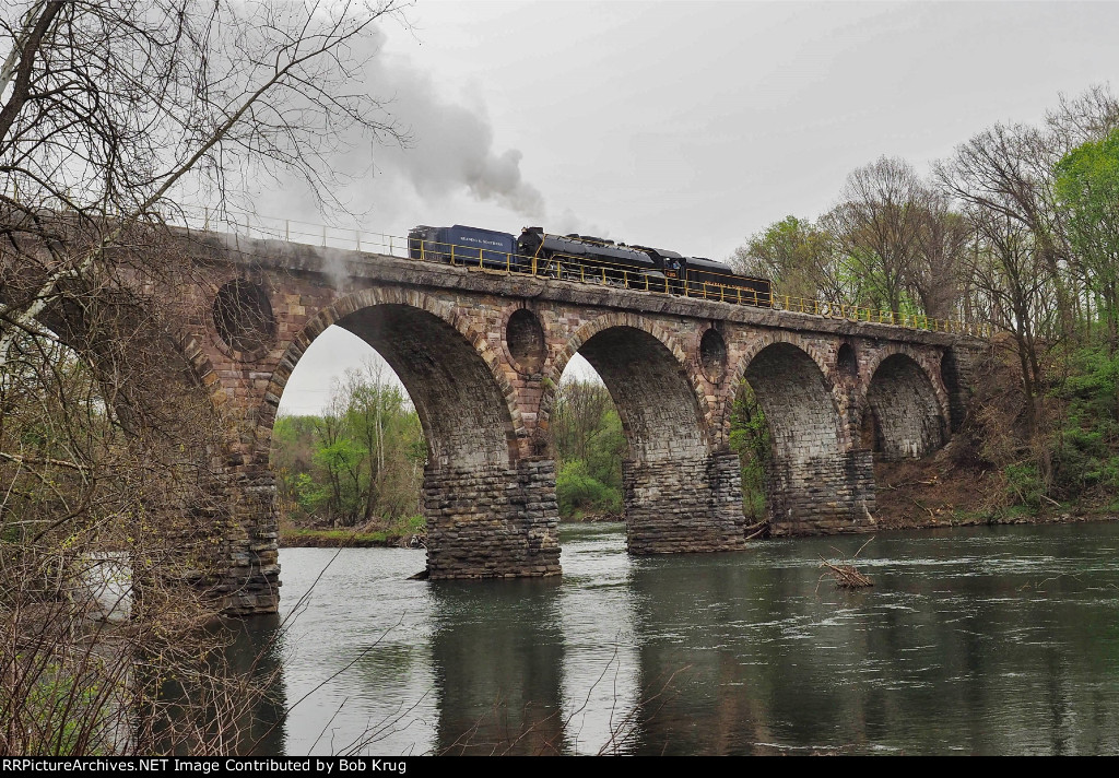 RBMN 2102 backs across the Peacock's Lock stone arch bridge into North Reading, PA